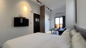 Letto o letti in una camera di 澎湖旅澄民宿 ph880Journey
