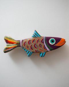 a colorful fish toy is hanging on a wall at Hotel Altes Fährhaus in Berlin +68 photos