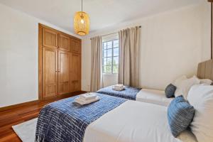 Ένα ή περισσότερα κρεβάτια σε δωμάτιο στο Sunny House by Homie