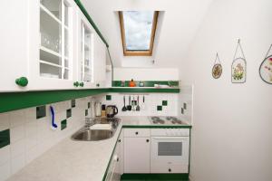 Kuchyň nebo kuchyňský kout v ubytování Landhaus Gailer + 12 fotografií