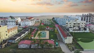 an aerial view of a city with buildings at Silver Sand Eco Resort !! Beachfront !! in Mandarmoni