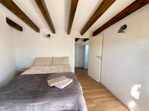 Postel nebo postele na pokoji v ubytování Apartamentos via street 3000