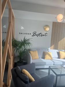 a living room with a couch and a table at Saladar Suites Boutique in Morro del Jable