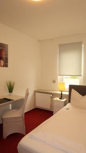 Postel nebo postele na pokoji v ubytování Hotel Zur Kripp