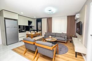 a living room with a couch and a table at Luxury Life Suites in Istanbul