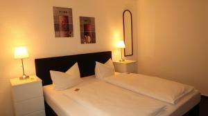 Postel nebo postele na pokoji v ubytování Hotel Zur Kripp