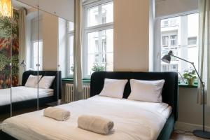 Ένα ή περισσότερα κρεβάτια σε δωμάτιο στο RentPlanet - Apartamenty Stare Miasto