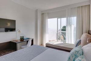Postel nebo postele na pokoji v ubytování ILUNION Palmanova Mallorca