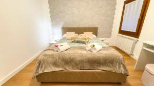 Una cama o camas en una habitación de C'ali by Ca-Sa Check