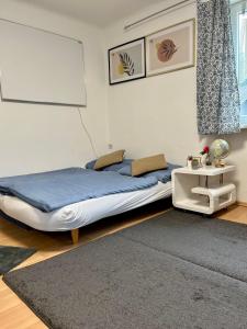 Postel nebo postele na pokoji v ubytování Niklasdorf Bergblick/Erholung