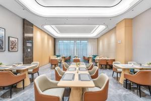 Posezení v ubytování Country Inn & Suite by Radisson, Kunming Changshui International Airport