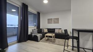Posezení v ubytování Apartman C601