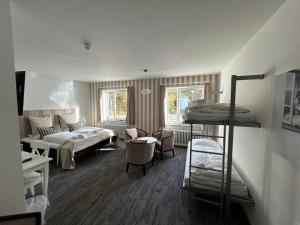 Postel nebo postele na pokoji v ubytování Hotel Højbysø