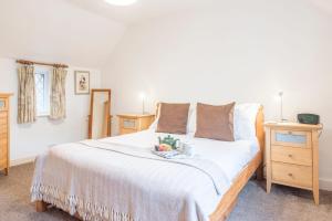 En eller flere senge i et værelse på Ann Page Cottage, Aldeburgh