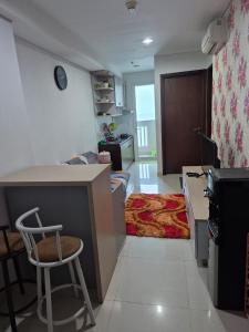 Kuchyň nebo kuchyňský kout v ubytování Apartment Borneo Bay City - Asnah Property