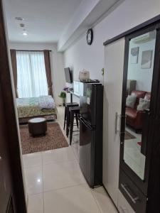Posezení v ubytování Apartment Borneo Bay City - Asnah Property