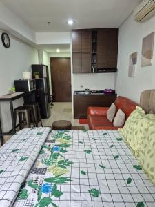 Postel nebo postele na pokoji v ubytování Apartment Borneo Bay City - Asnah Property