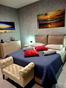 Postel nebo postele na pokoji v ubytování Matilde Valletta Suites
