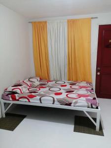 Postel nebo postele na pokoji v ubytování FJM Transient Homes - Tarlac City