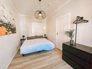 Postel nebo postele na pokoji v ubytování BetterBeds City - Apartments - Zentral - Smart TV - Küche - WLAN