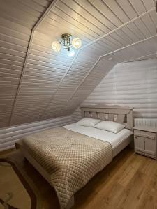 Letto o letti in una camera di Villa Anet