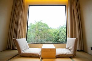 Posezení v ubytování Shanghai Xingshe Camping B&B Disney Branch