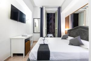 TV a/nebo společenská místnost v ubytování Hotel Max