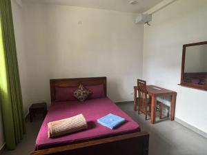 The Nest Kandana客房内的一张或多张床位