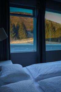 Letto o letti in una camera di Hótel Laugarvatn