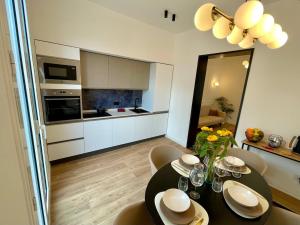Kuchyň nebo kuchyňský kout v ubytování Politeama's Home - Luxury Apartment + 10 fotografií
