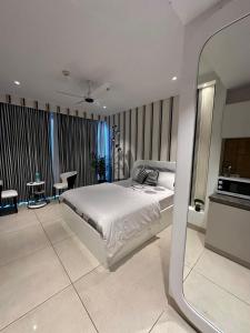 Katil atau katil-katil dalam bilik di Zebra Luxe Loft Studio with patio