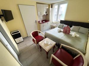 TV a/nebo společenská místnost v ubytování Gasthaus 210