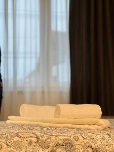 Postel nebo postele na pokoji v ubytování IL PRIMO Studio Apartment