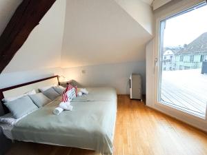 Postel nebo postele na pokoji v ubytování Gasthaus 210