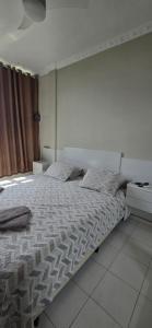 Ένα ή περισσότερα κρεβάτια σε δωμάτιο στο Botafogo - Melhor Vista