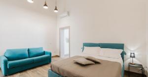 Ένα ή περισσότερα κρεβάτια σε δωμάτιο στο Da Mariano apartments