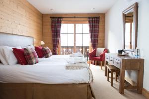 Mountain Lodge, Les Crosets客房内的一张或多张床位