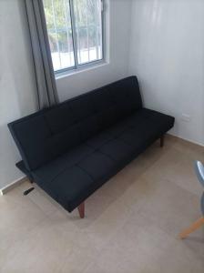 Posezení v ubytování bonito estudio para disfrutar casa palmeras