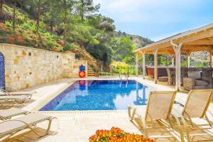 Φωτογραφία από το άλμπουμ του Pomos view στην Παχύαμμο
