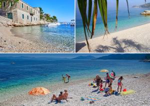 a group of people on a beach near the water at Il Mare - beach house in Blato