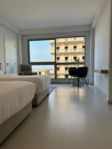 Letto o letti in una camera di The View - Saint George Hotel