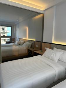 Letto o letti in una camera di The View - Saint George Hotel