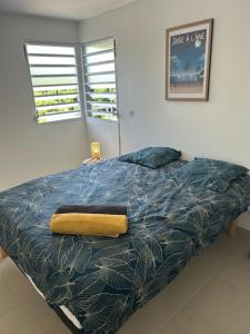 Postel nebo postele na pokoji v ubytování Palme bleue t3 au diamant + 28 fotografií