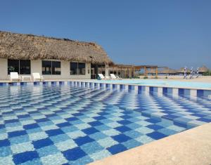 Bazén v ubytování Hotel Arena Beach Cartagena nebo v jeho okolí