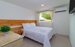 Postel nebo postele na pokoji v ubytování Hotel Arena Beach Cartagena + 37 fotografií