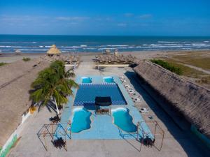 Bazén v ubytování Hotel Arena Beach Cartagena nebo v jeho okolí