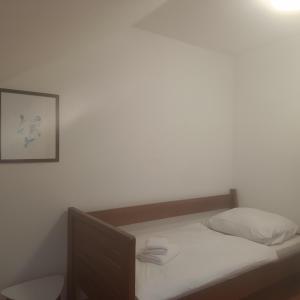 Posteľ alebo postele v izbe v ubytovaní Frymburk Penzion u Dušků
