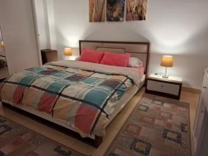 Postel nebo postele na pokoji v ubytování Madinty amazing view 2 rooms fully air-conditioned apartment at Madinty city for families only مدينتي