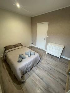 En eller flere senge i et værelse på Appartement proche cathédrale