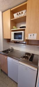 Køkken eller tekøkken på Résidence Ski Azur